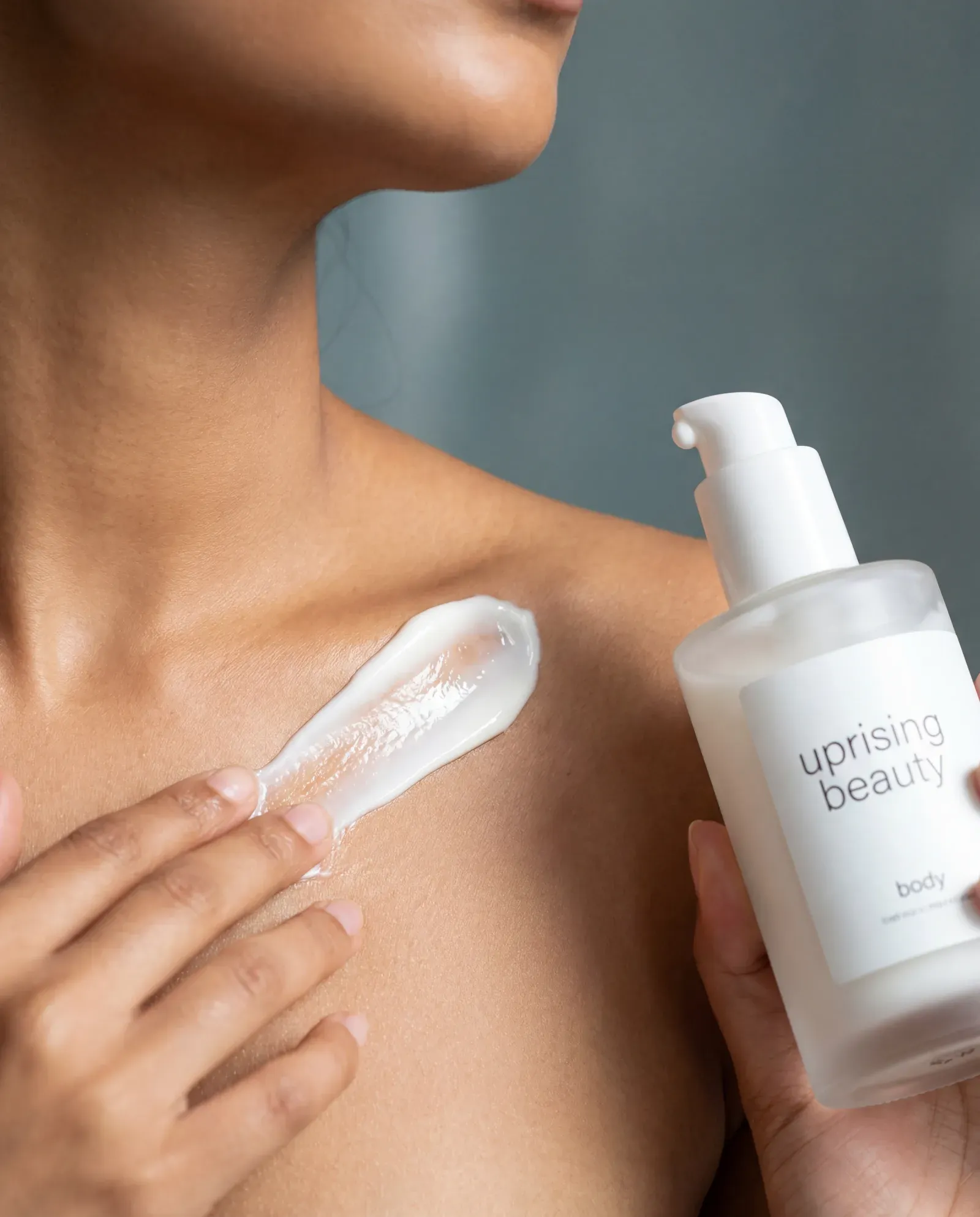 Body care editorial composition, body cream along the collarbone