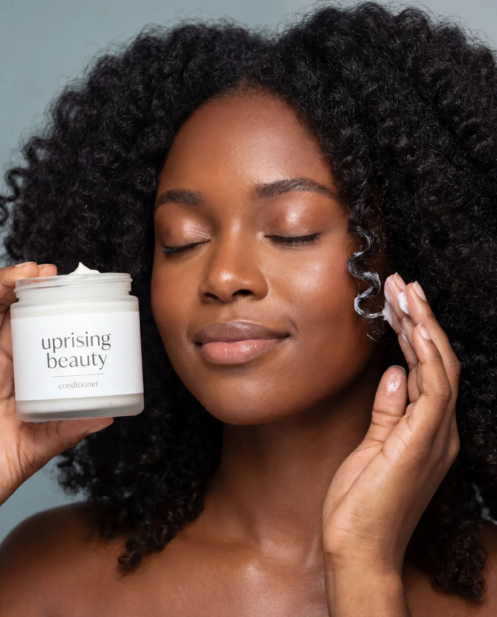 Hair care editorial composition, products arranged along the hair shaft